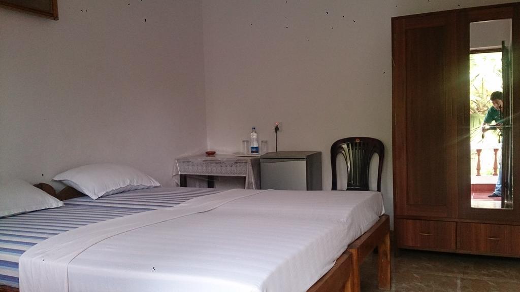 Domingos Guest House Baga Habitación foto